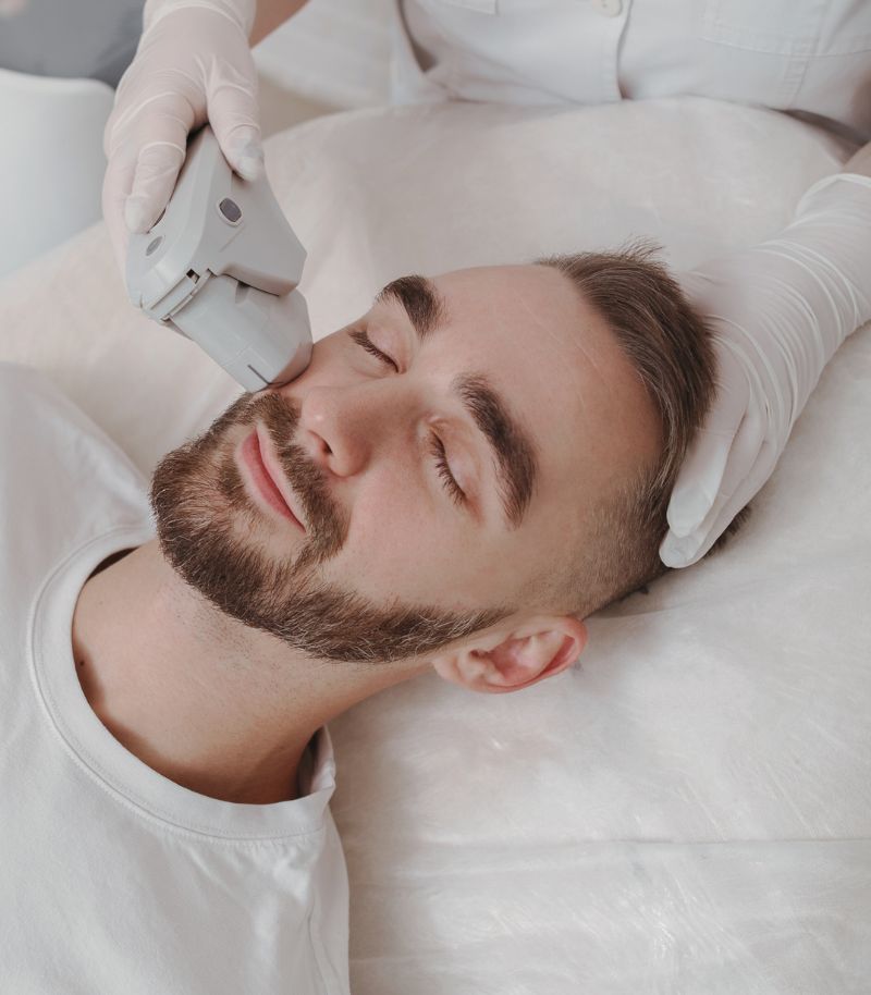 Prevention and early signs of ageing Young man caring for his skin as a preventive anti-ageing treatment using Clear & Brilliant technology